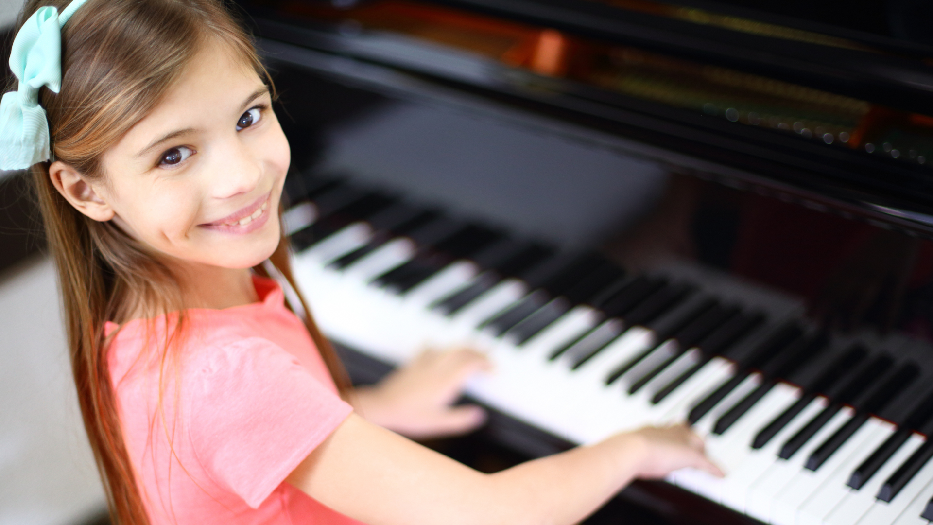 Girl playing piano - Artisan Piano Tuning and Restoration